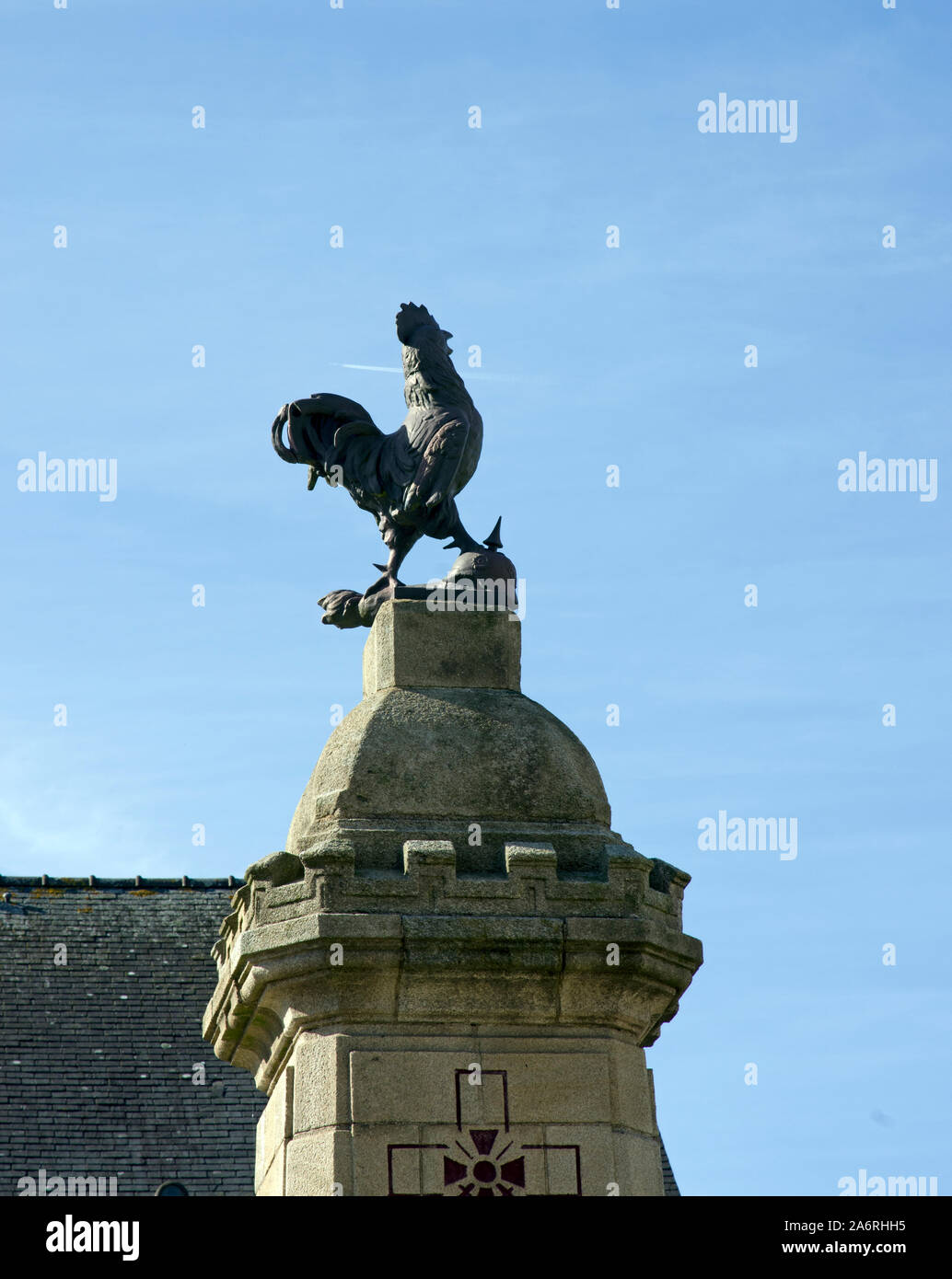 French cockerel standing on a German helmet of WW1 Stock Photo