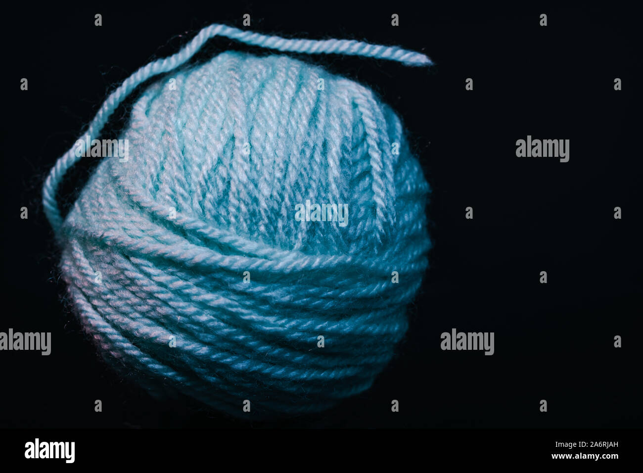 Beautiful blue tangle of thread in red and blue light background ...