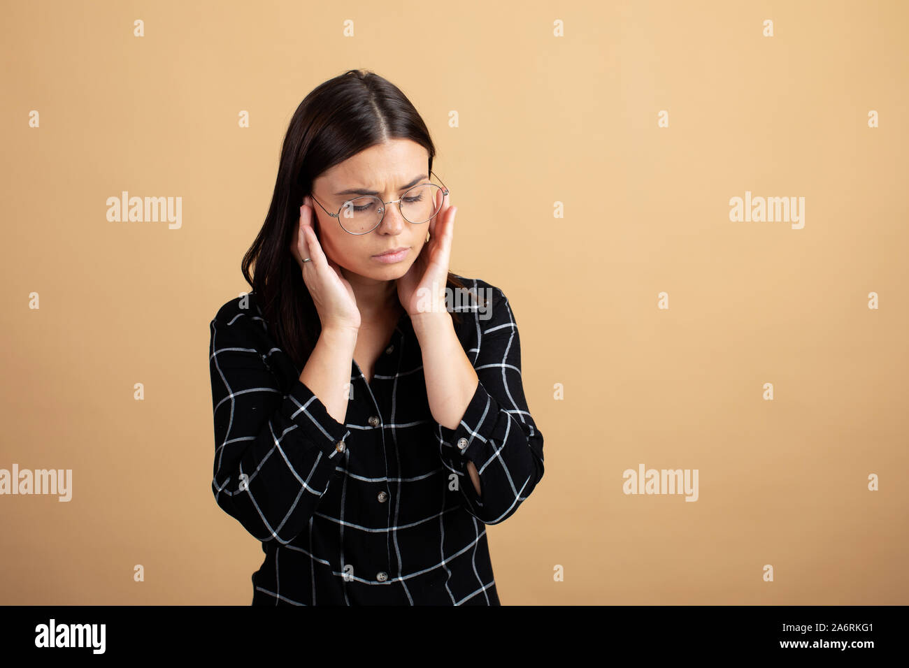 Hand on temples hi-res stock photography and images - Alamy