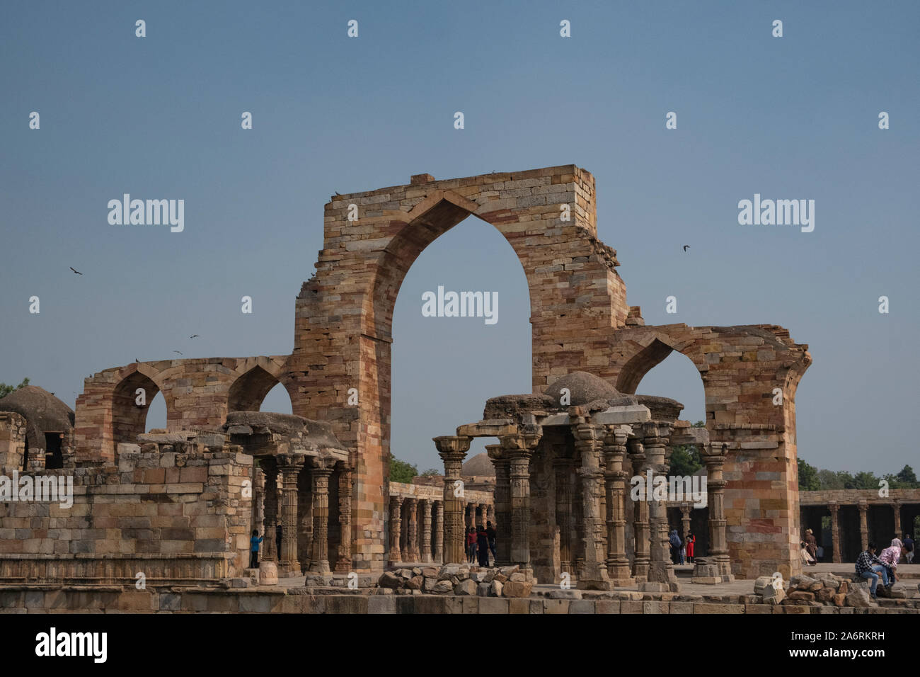 Quwwat-ul-Islam (or Might of Islam) mosque started in 1193 CE by Qutb-ud-din-Aibak to mark his victory over Rajput Jains. Qutub Minar Complex, Delhi. Stock Photo