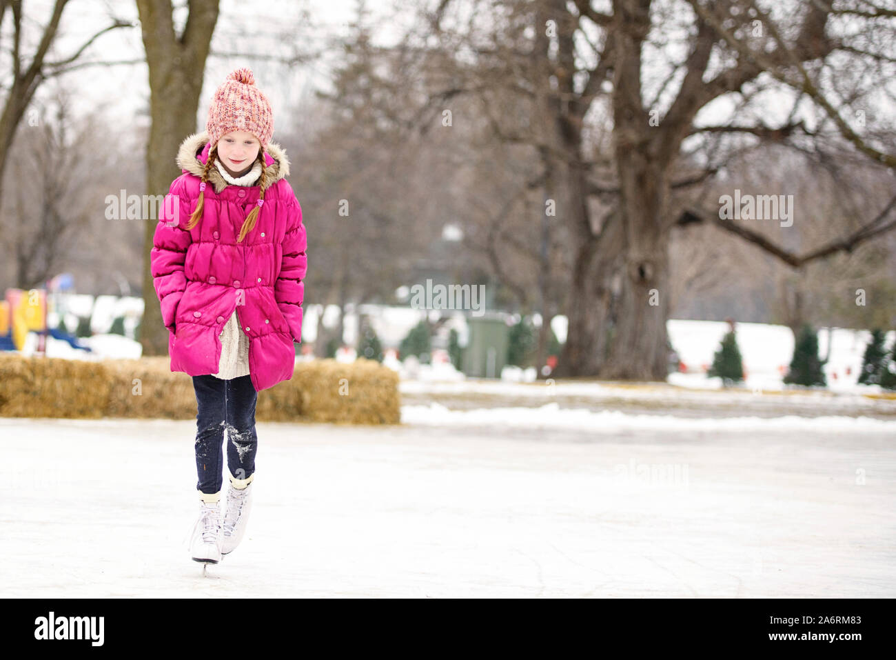 Little Girl Ice Skating Outdoors Stock Photo Alamy