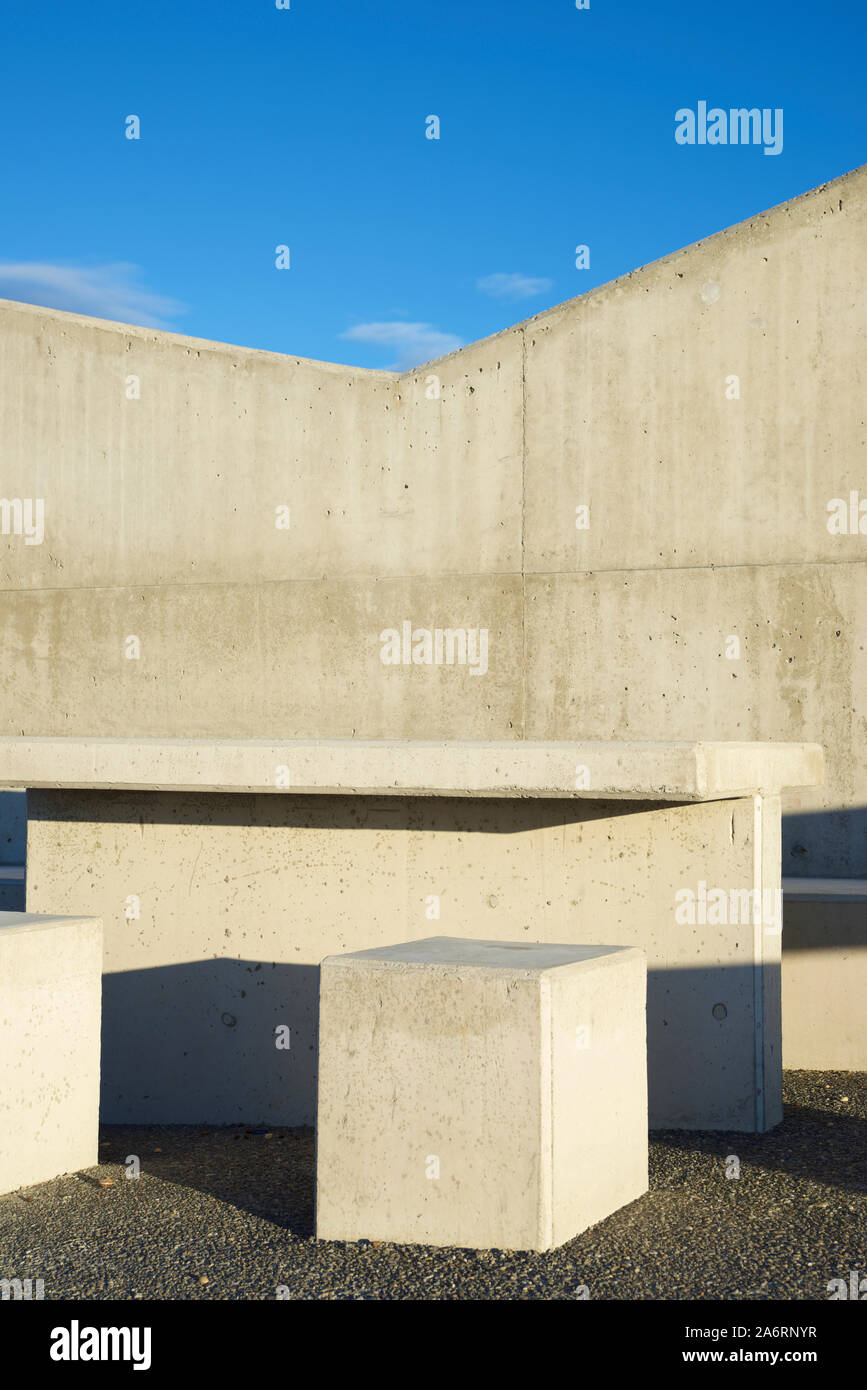 Concrete benches in a rest area on the highway. Stock Photo