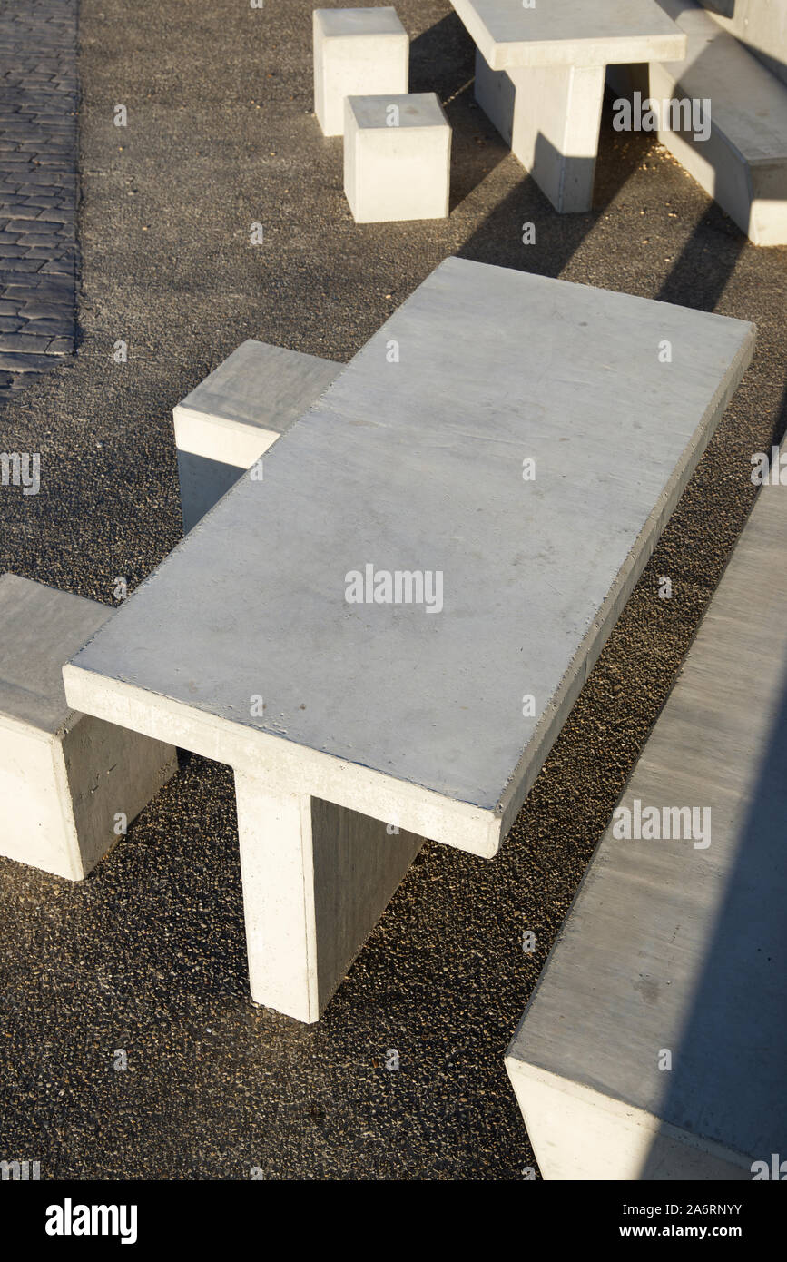 Concrete benches in a rest area on the highway. Stock Photo