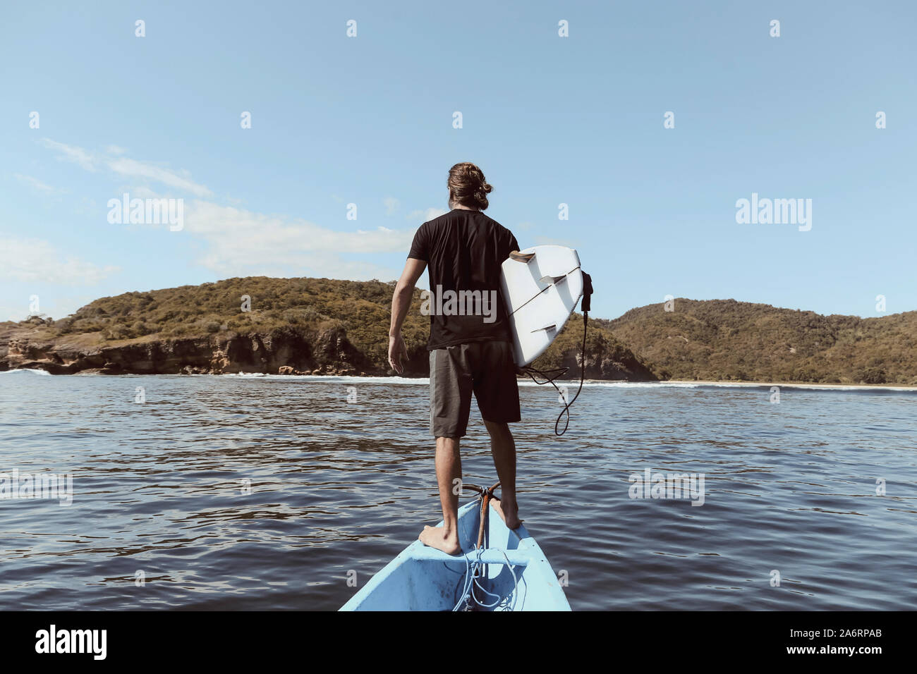 Surfer in a boat Stock Photo