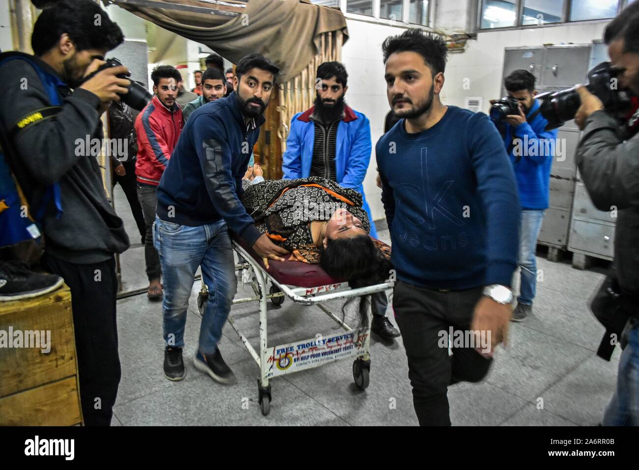Injured woman on stretcher hi-res stock photography and images - Alamy