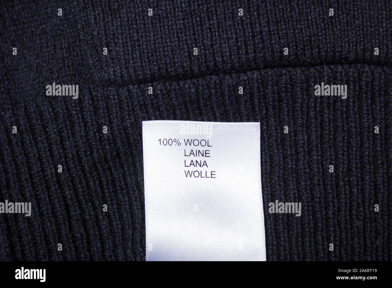 Label on the sweater. 100 wool Stock Photo - Alamy