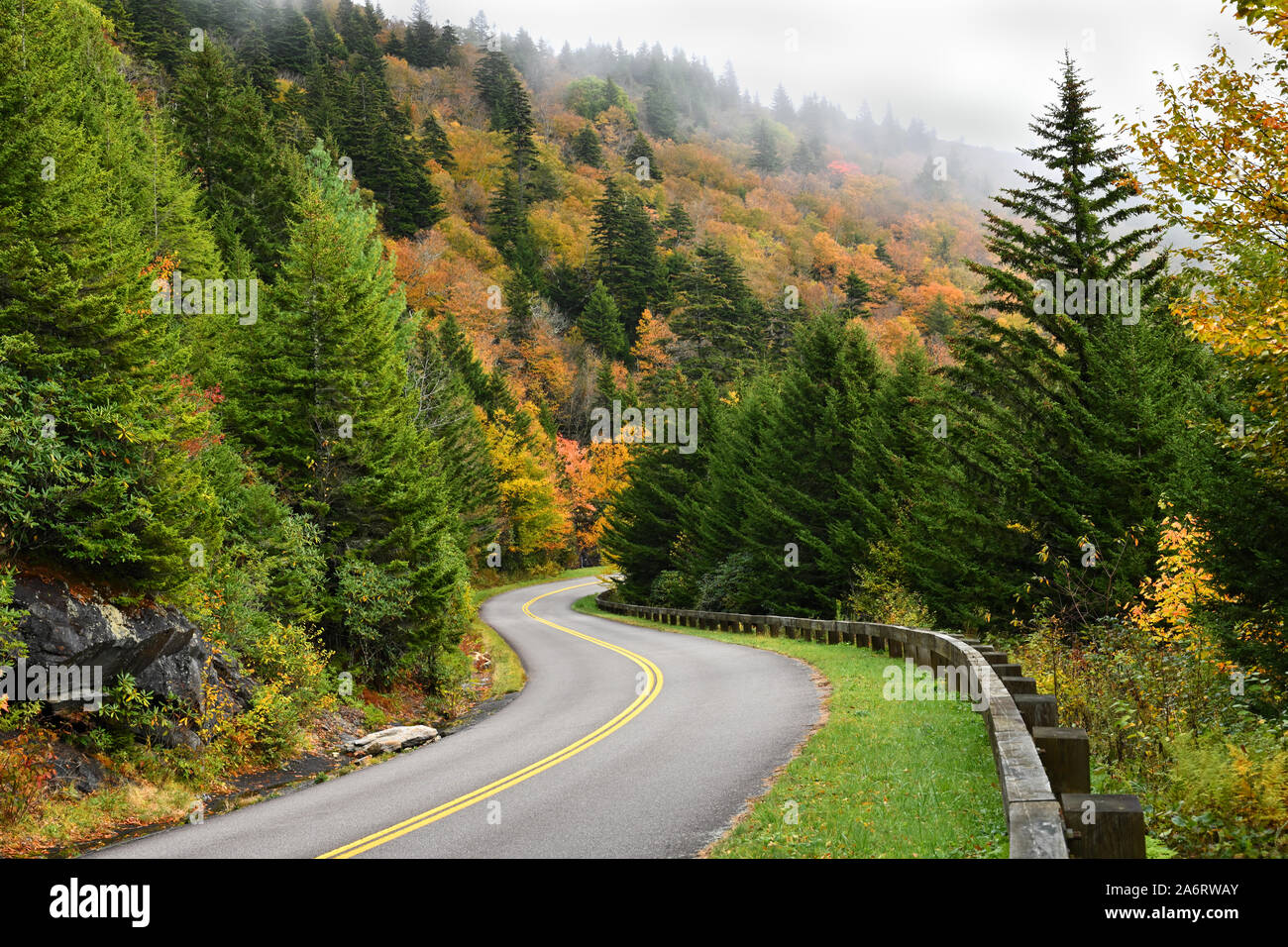 The autumn colors are inviting on Blue RIdge Parkway in October. The ancient, misty, Blue RIdge Mountains invite a peaceful feeling. Stock Photo
