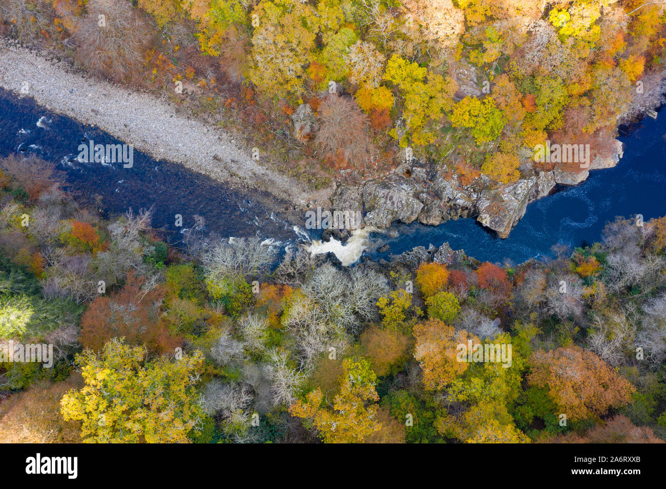 Killiecrankie, Perthshire, Scotland, UK. 28th October 2019. Autumnal colours in trees beside the River Garry seen from a drone at Killiecrankie in Perthshire. Pictured; Famous Soldier's Leap, the spot where a Redcoat soldier leapt 18ft across the raging River Garry, fleeing the Jacobites. Iain Masterton/Alamy Live News. Stock Photo