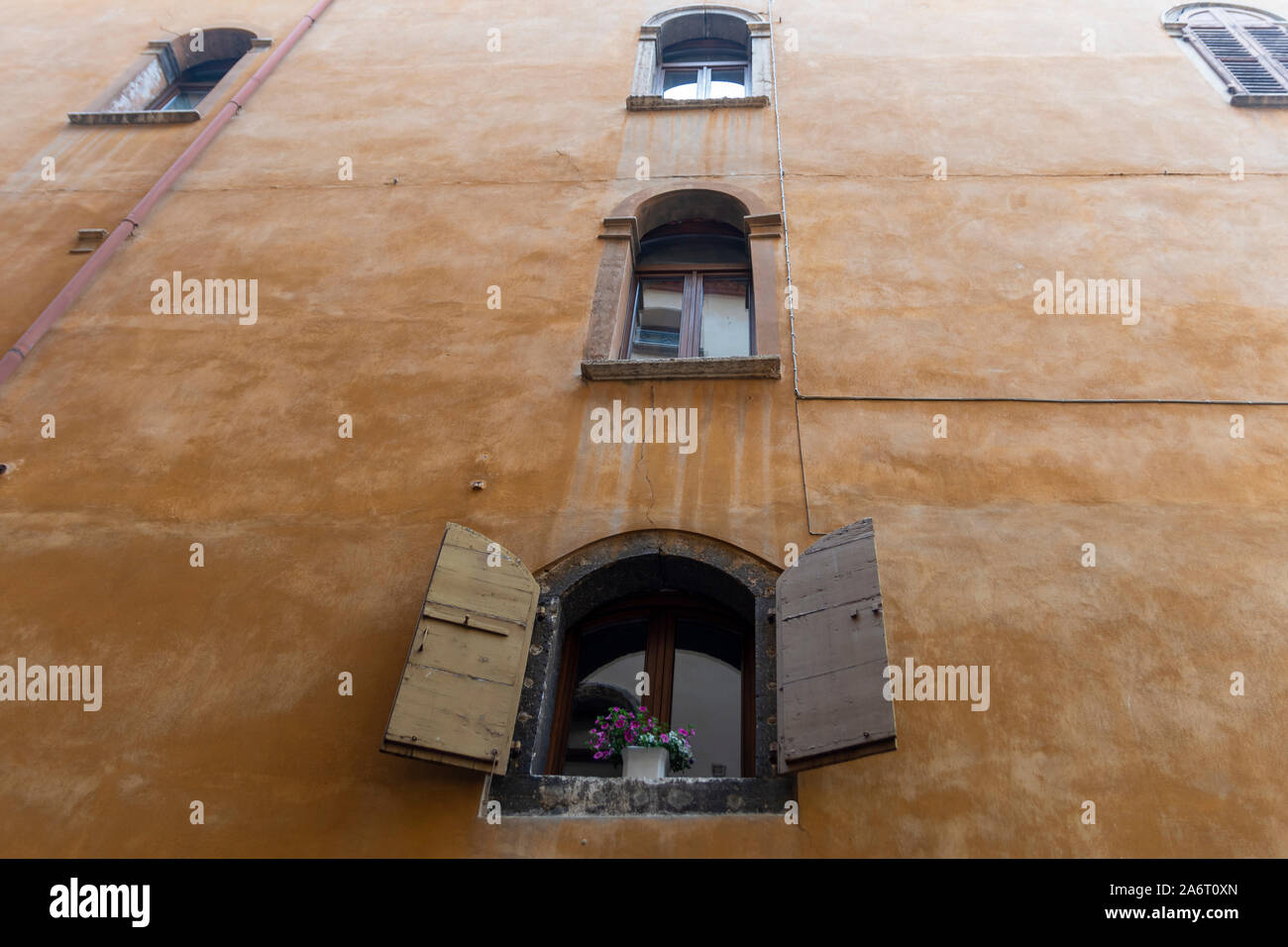 Facade of an old house with wooden window shutter, picture from Belluno ...