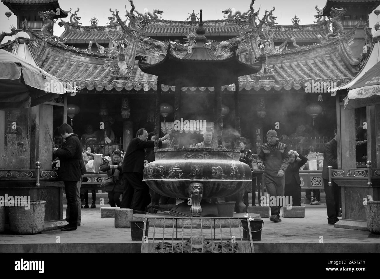 Old traditions at Tonghuai Guanyue temple of Chinese native religion in Quanzhou, China - black and white Stock Photo