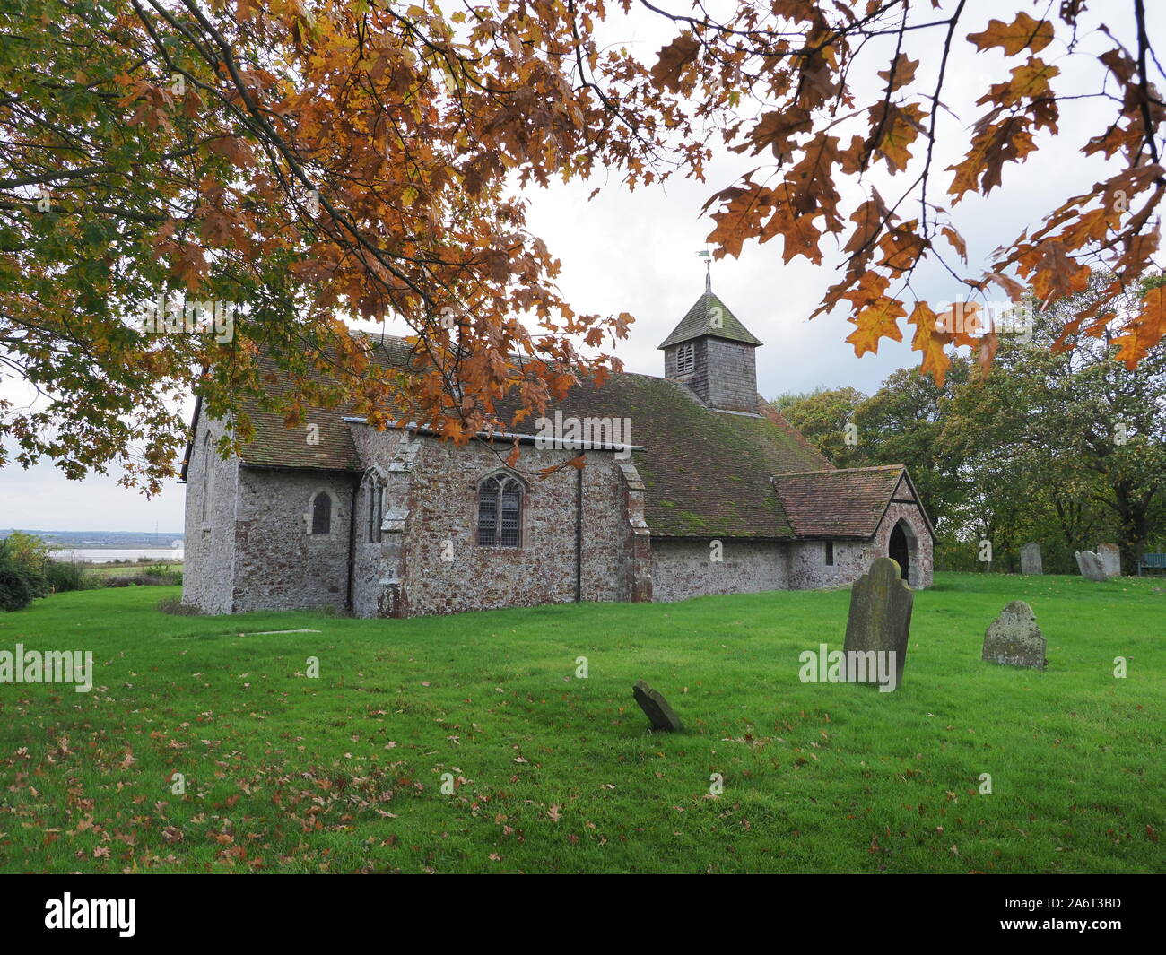 Harty, Kent, UK. 28th October, 2019. UK Weather: overcast skies and Autumn colours at Kent's most remote church - the St Thomas the Apostle located in Harty, Kent. Credit: James Bell/Alamy Live News Stock Photo