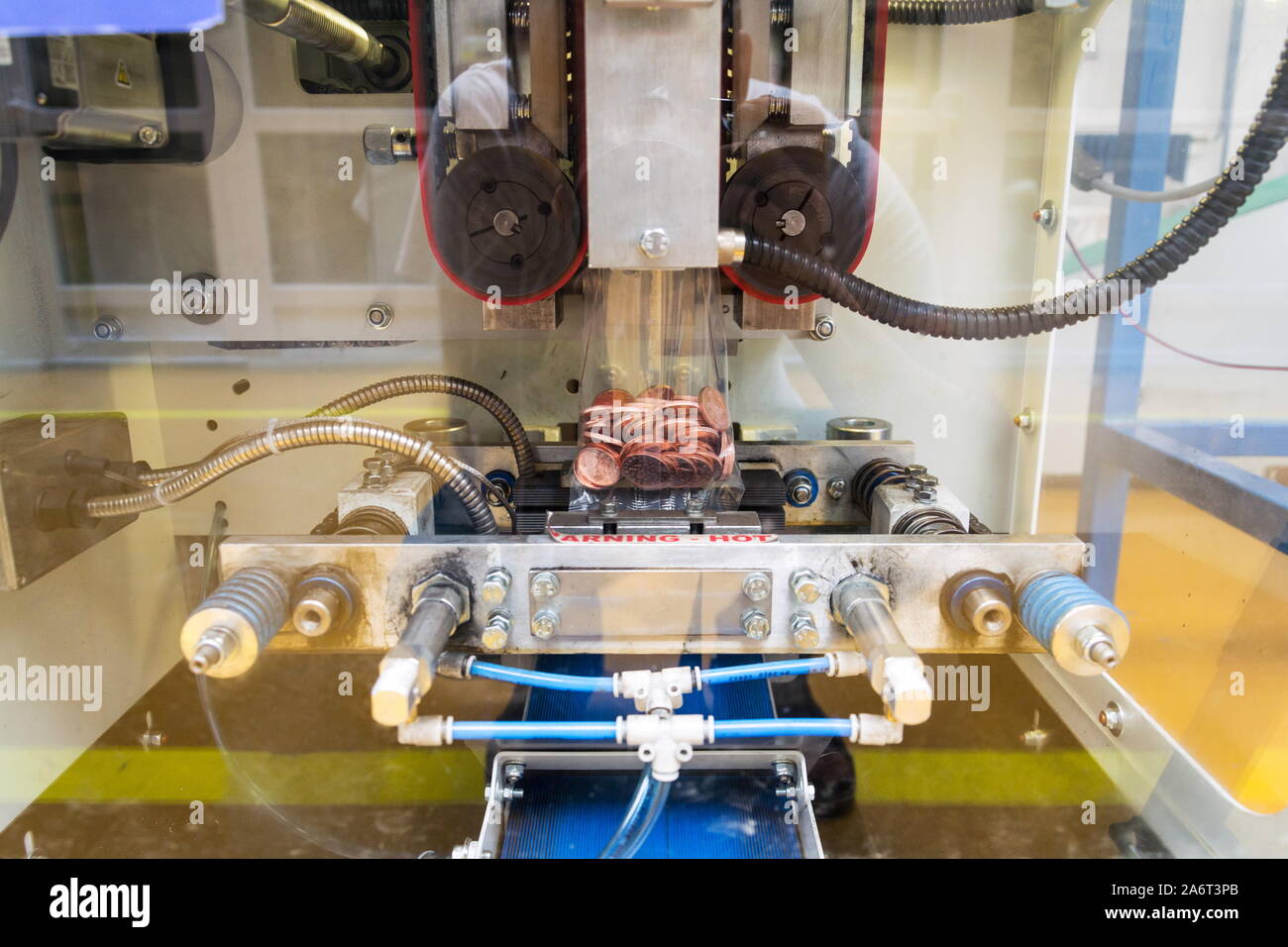 Coin minting machine hires stock photography and images Alamy