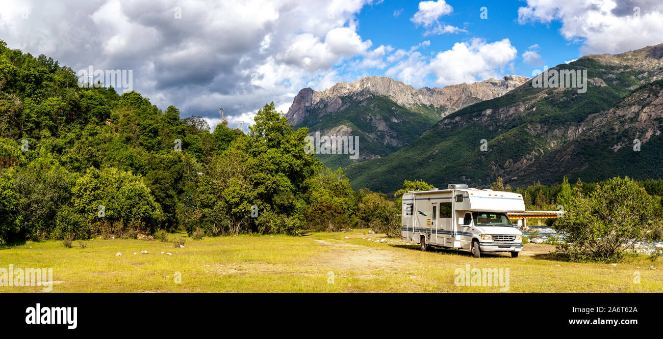 Motorhome in Chilean Argentine mountain Andes. Family trip travel vacation on Motorhome RV in Andes. Stock Photo