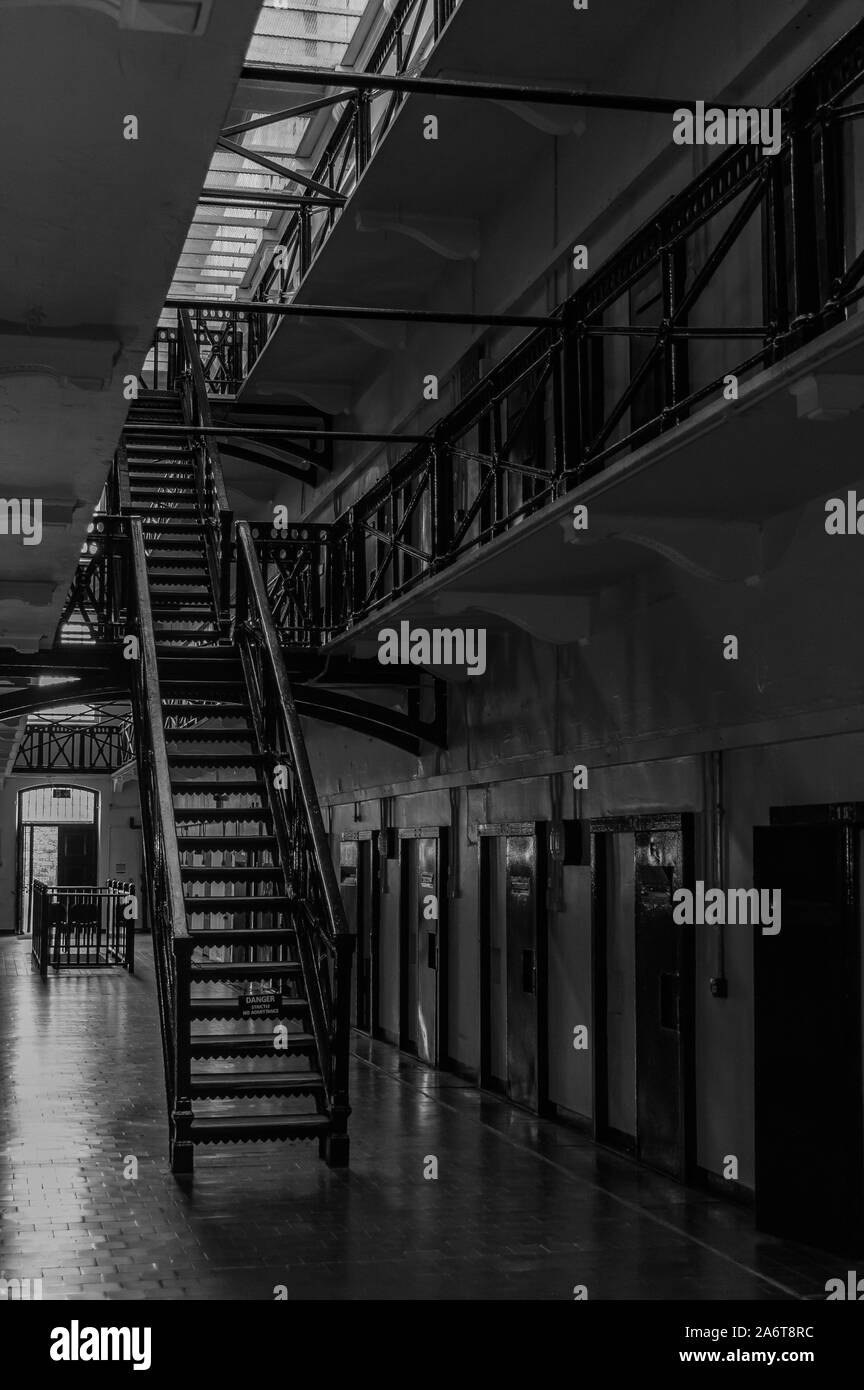 A black and white picture of the interior of a wing in the Crumlin Road Gaol (Belfast). Stock Photo