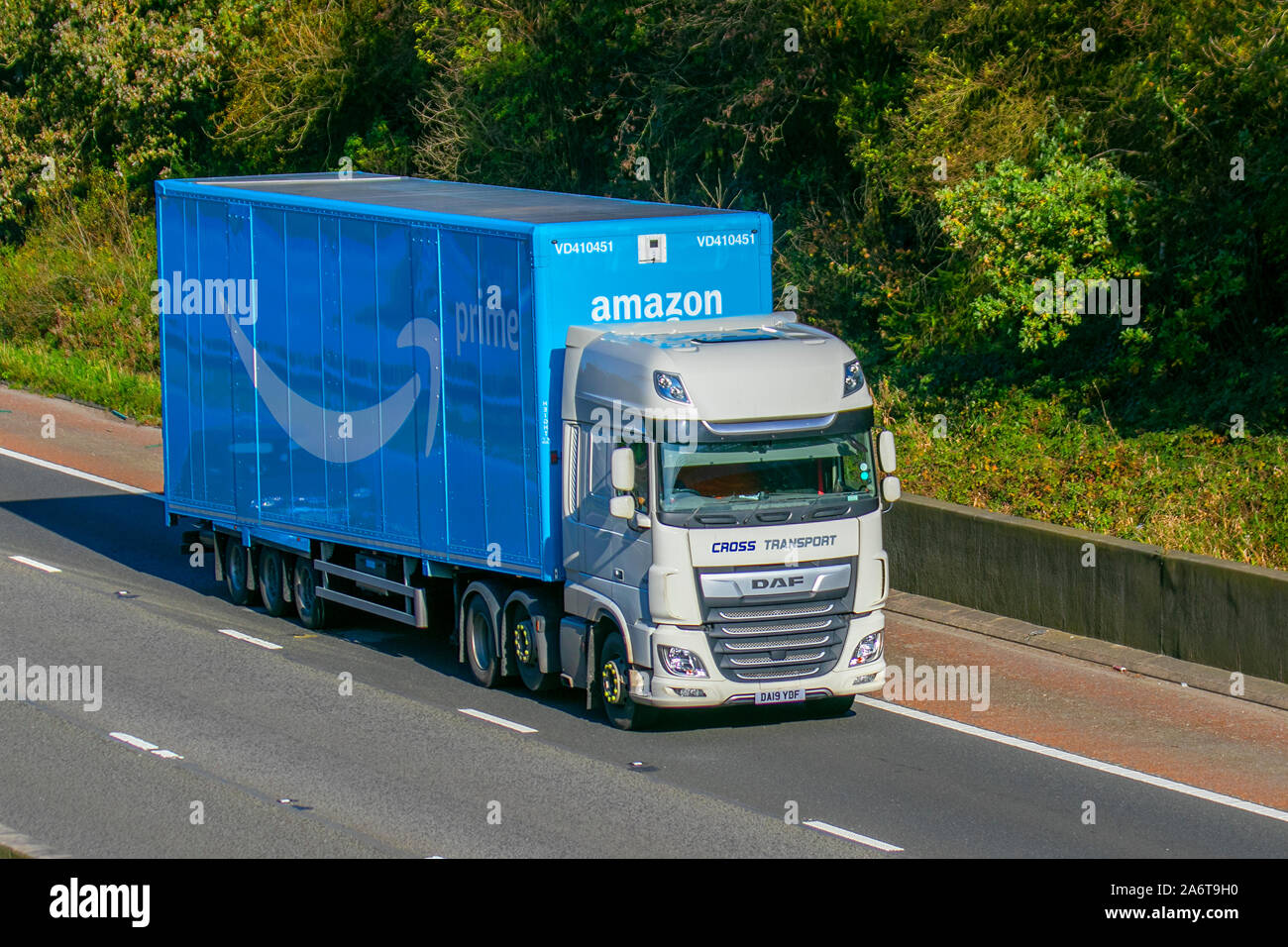 AMAZON PRIME Cross Transport Haulage delivery trucks, lorry,  transportation, truck, cargo, DAF vehicle, delivery, commercial transport,  industry, supply chain freight, on the M6 motrorway at Lancaster, UK Stock  Photo - Alamy