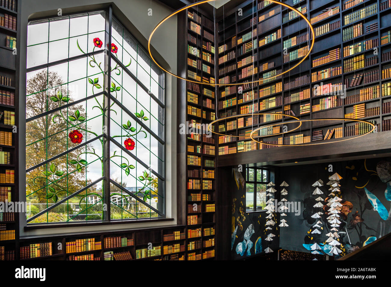 Old and new come together at the five-star Dunloe Hotel & Gardens near Killarney, County Kerry, Ireland: the original flower windows were inserted into the towers, which are clad in local natural stone. Stock Photo