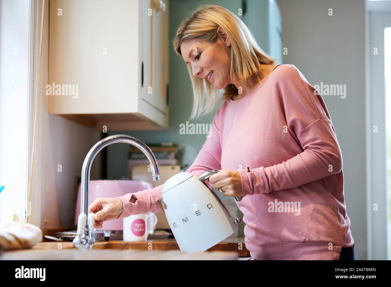 Filling kettle with water hires stock photography and images Alamy