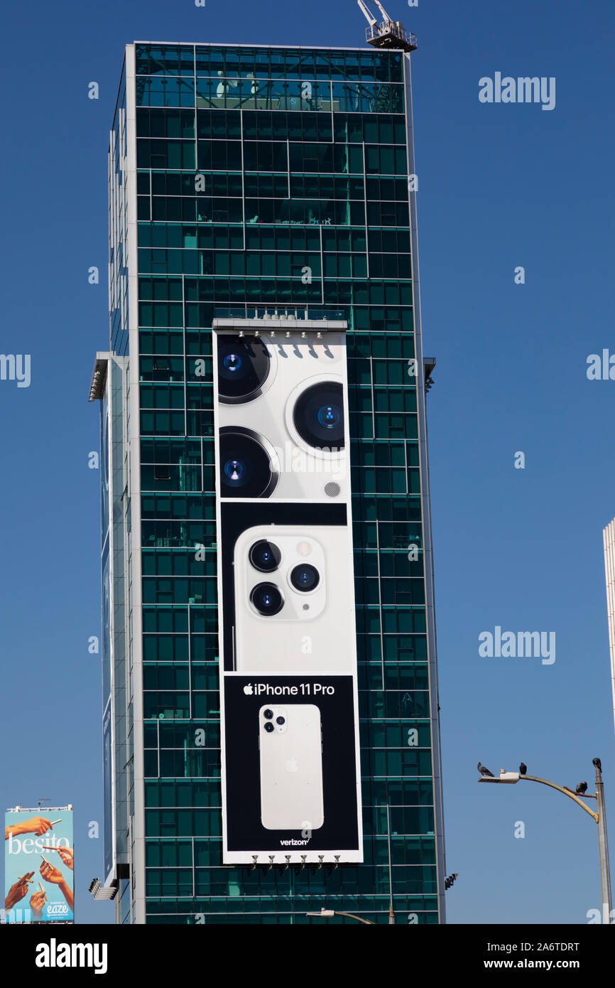 Sunset Vine Tower high rise apartment skyscraper with Apple iphone xi giant billboard advertisement, 1480 Vine Street, Los Angeles, California, United Stock Photo