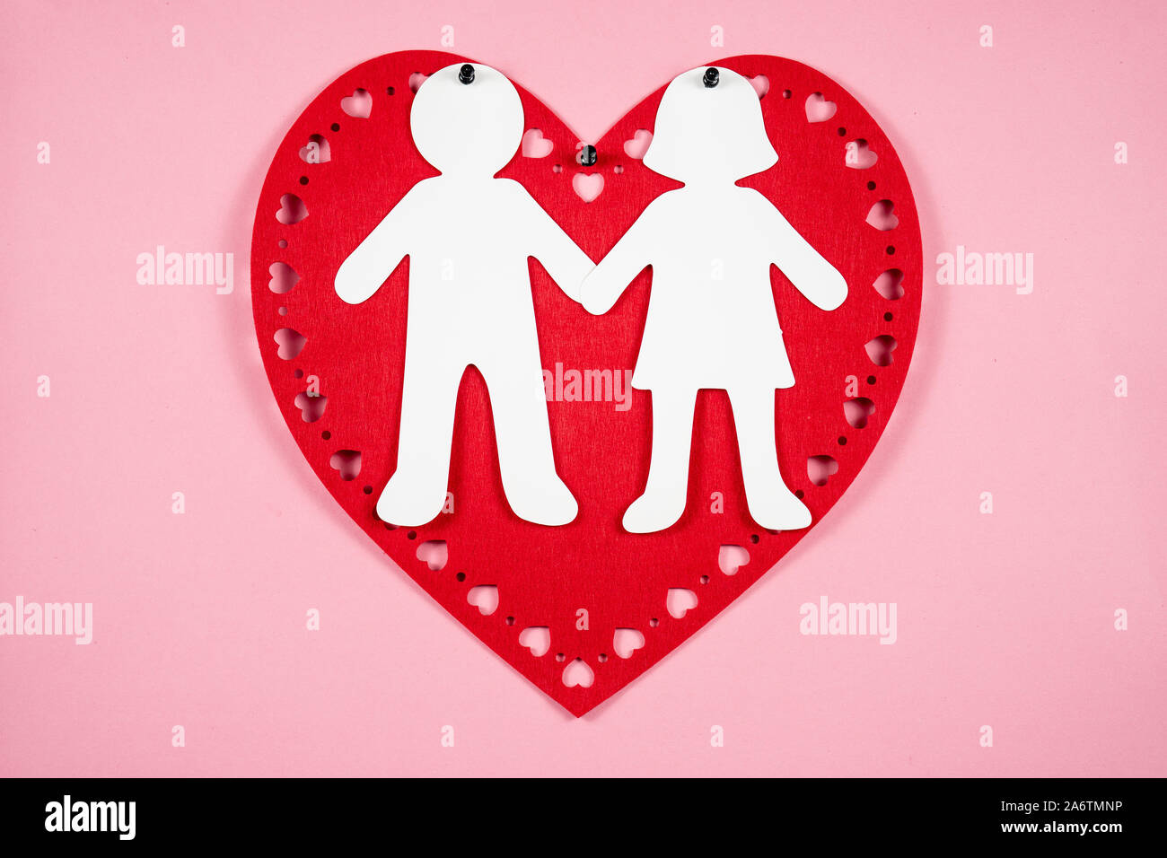 Large paper people shapes.Love concept Stock Photo - Alamy