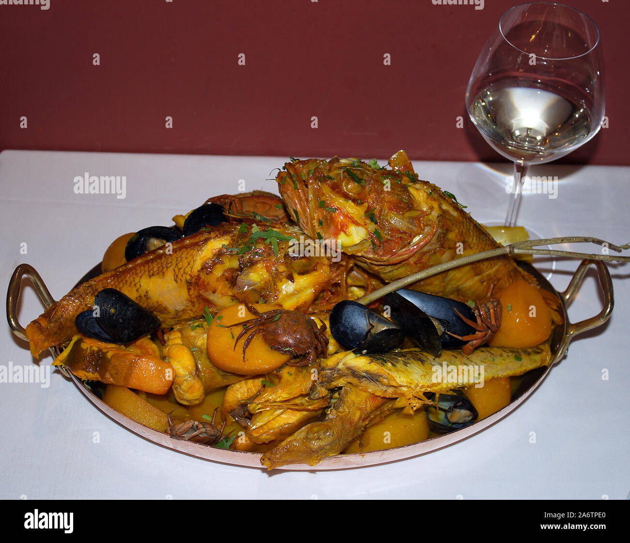 Dish of bouillabaisse in Le Miramar restaurant, Old Port, Marseille, France Stock Photo