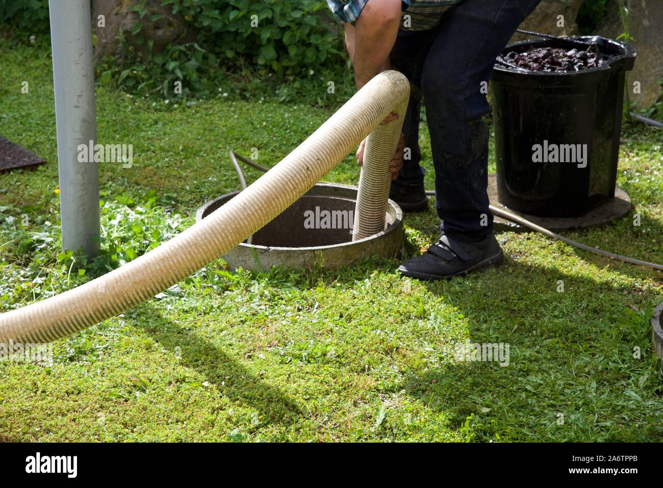 Septic tank: the removal of sewage sludge and cleaning of a domestic ...