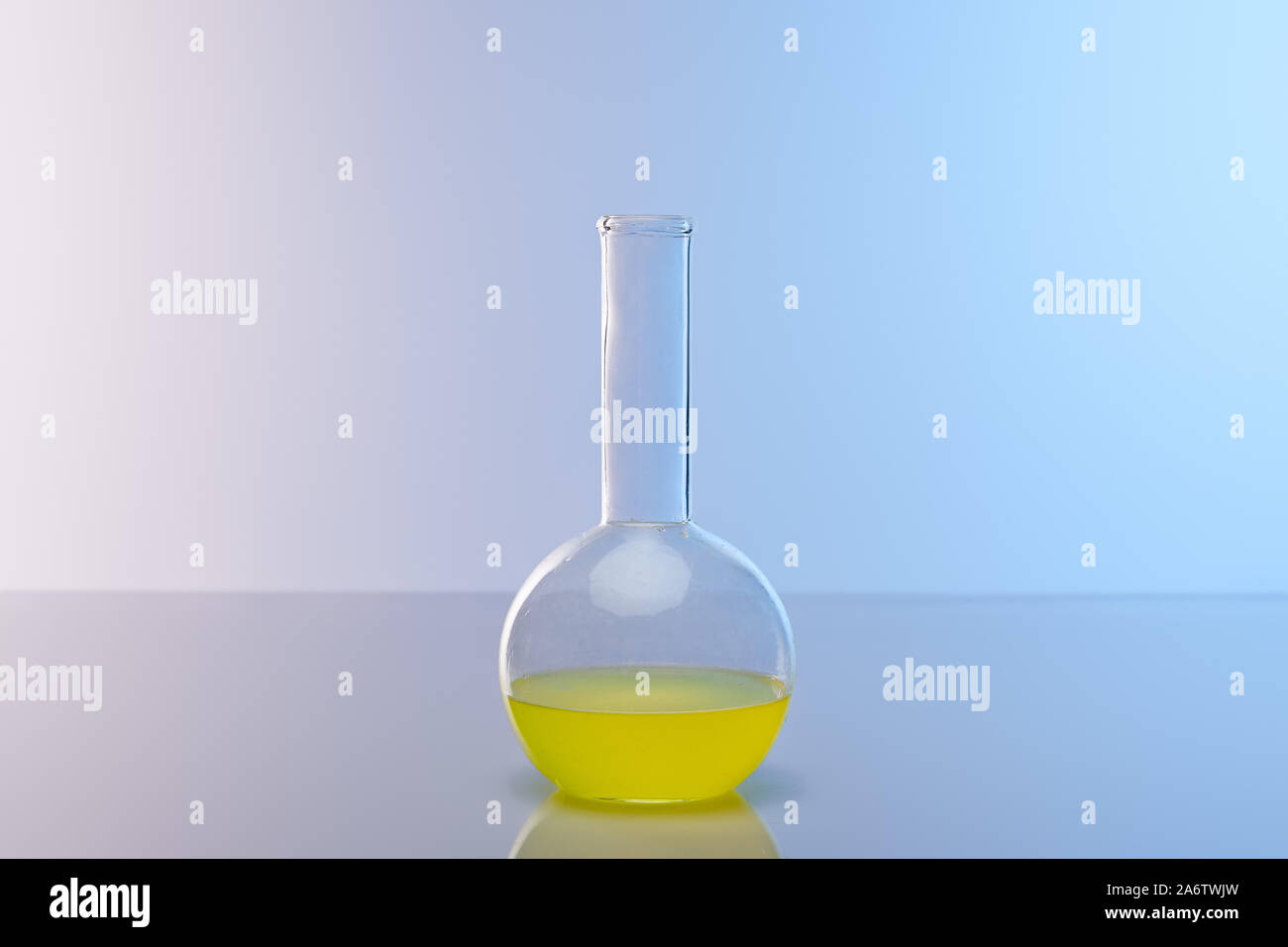 Download Glass Flask With Colorful Yellow Liquid Stock Photo Alamy PSD Mockup Templates
