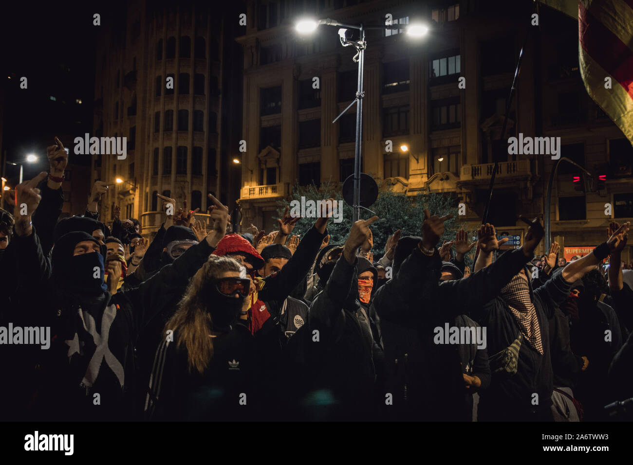 Protesters insulting the national police with songs in Via Laietana, Barcelona, Spain Stock Photo