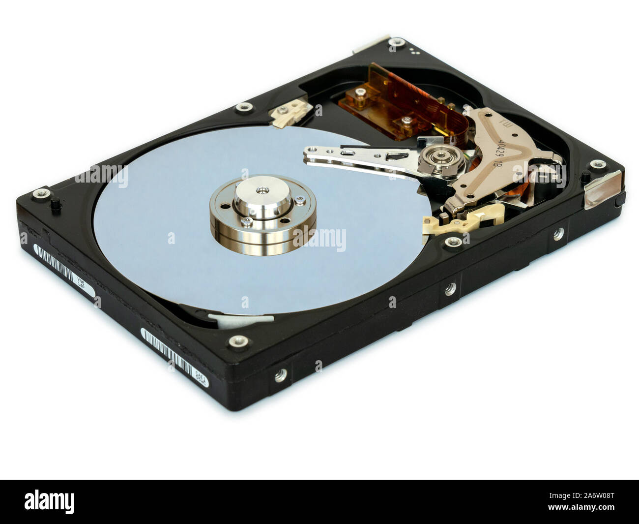 Inside a dismantled 3.5 inch computer hard-disk data storage drive showing platter and read write head. Stock Photo