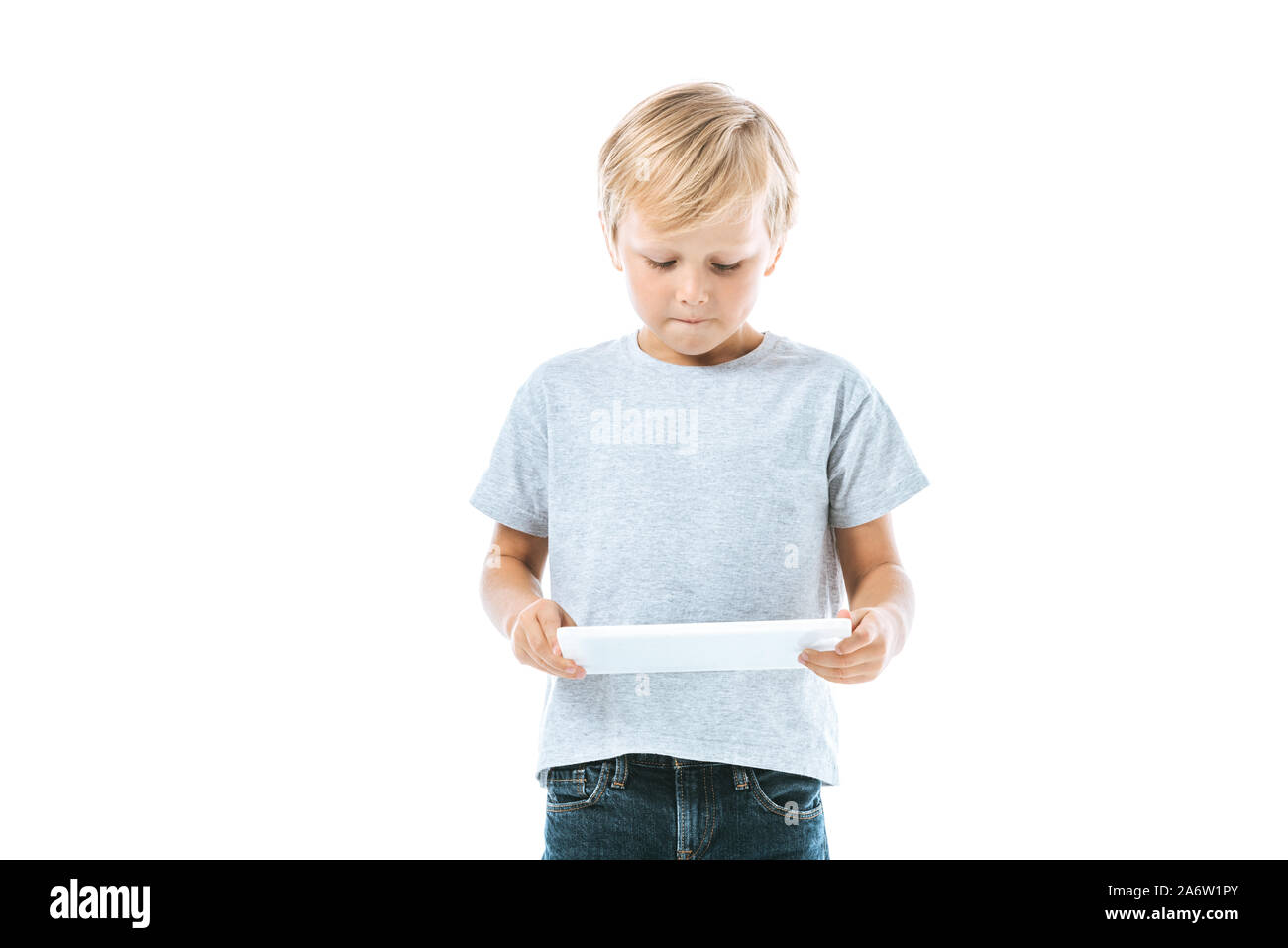 cute boy using digital tablet isolated on white Stock Photo