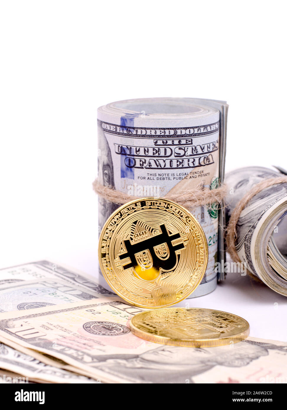 Shiny Gold Dollar Sign Necklace and Physical Bitcoin on a United States  Dollar Bills. Financial business background Stock Photo - Alamy