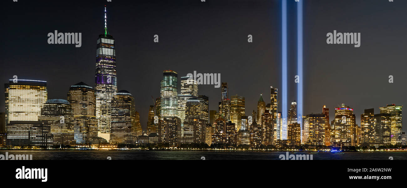 WTC 911 Tribute In Lights - Panoramic view to the lower Manhattan skyline with One World Trade Center commonly reffered to as the Freedom Tower during Stock Photo
