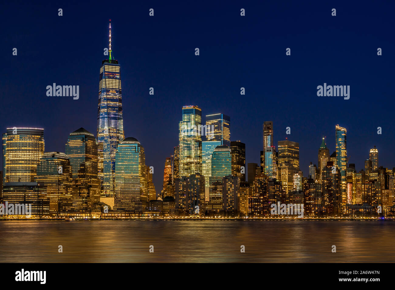 Manhattan NYC Skyline Twilight - The lower Manhattan, New York City skyline during the blue hour of twilight. Stock Photo