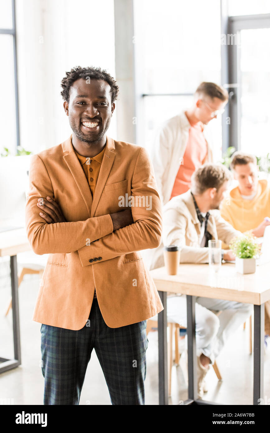 Happy smiling businessman with crossed arms pose hi-res stock ...