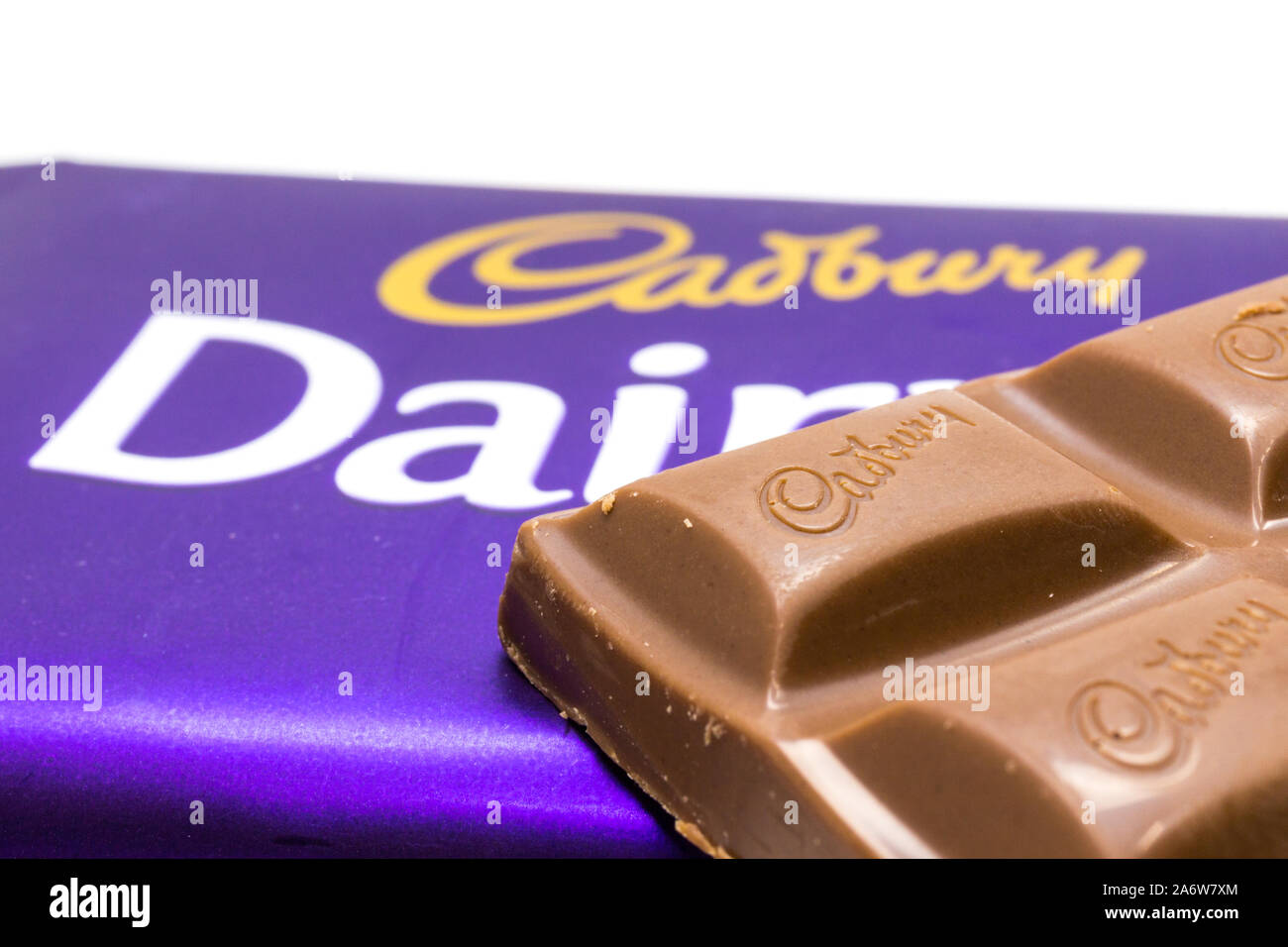 Cadbury dairy milk chocolate bars wrapped and unwrapped Stock Photo