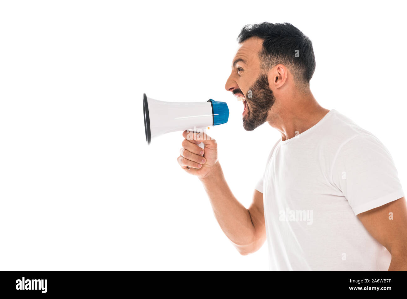 side view of angry man screaming in megaphone isolated on white Stock Photo