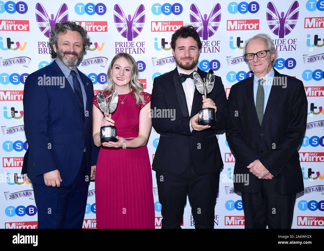 Alice Thompson and Josh Littlejohn with the Special Recognition Award, presented by Michael Sheen and Ken Loach, in the press room during the Pride of Britain Awards held at the The Grosvenor House Hotel, London. Stock Photo
