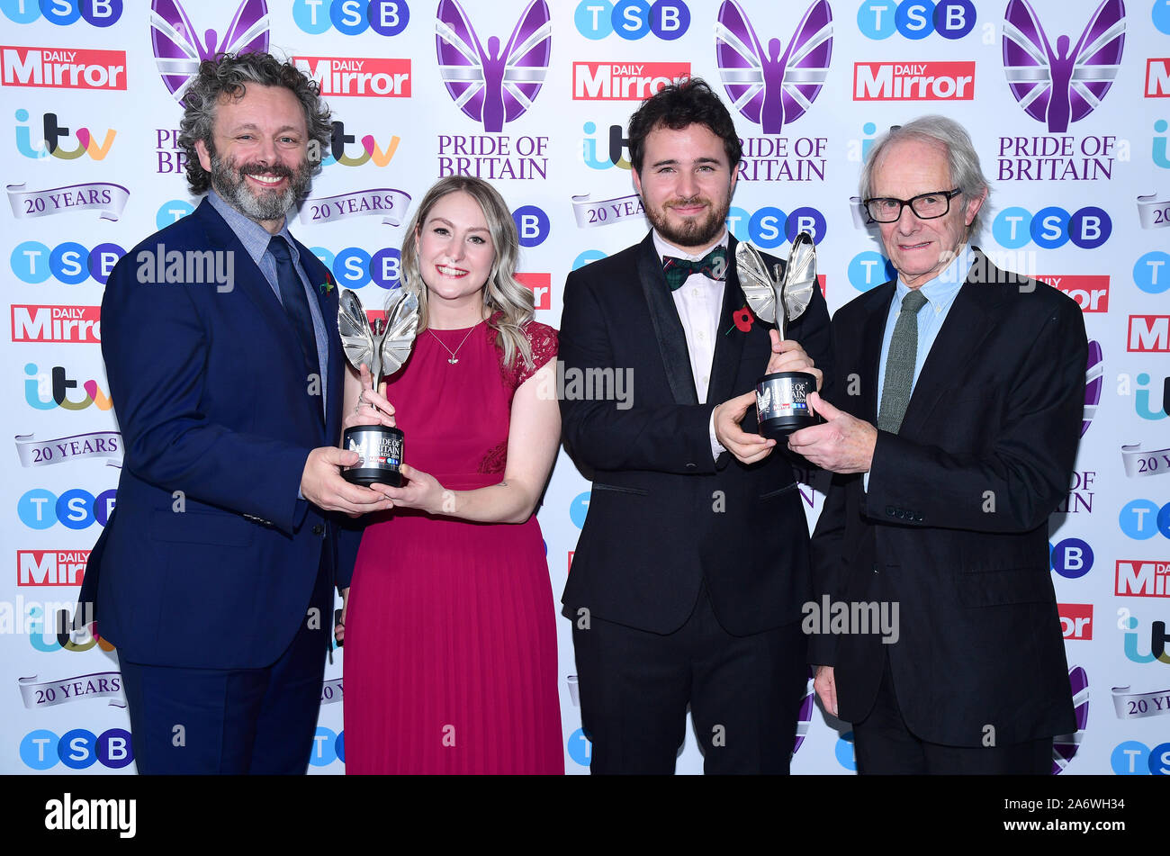 Alice Thompson and Josh Littlejohn with the Special Recognition Award, presented by Michael Sheen and Ken Loach, in the press room during the Pride of Britain Awards held at the The Grosvenor House Hotel, London. Stock Photo