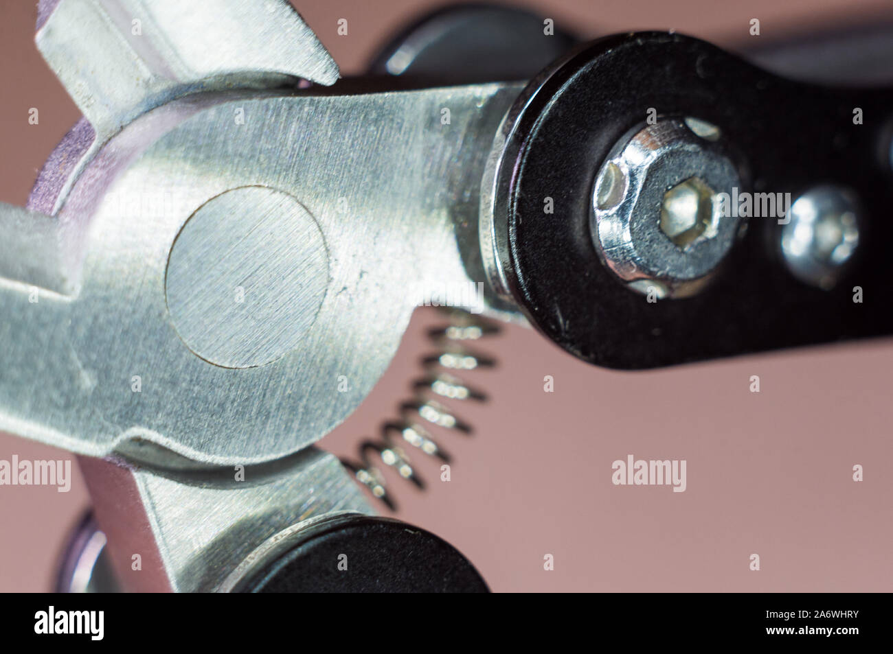 elements small foldable steel multitool, closeup, macro Stock Photo
