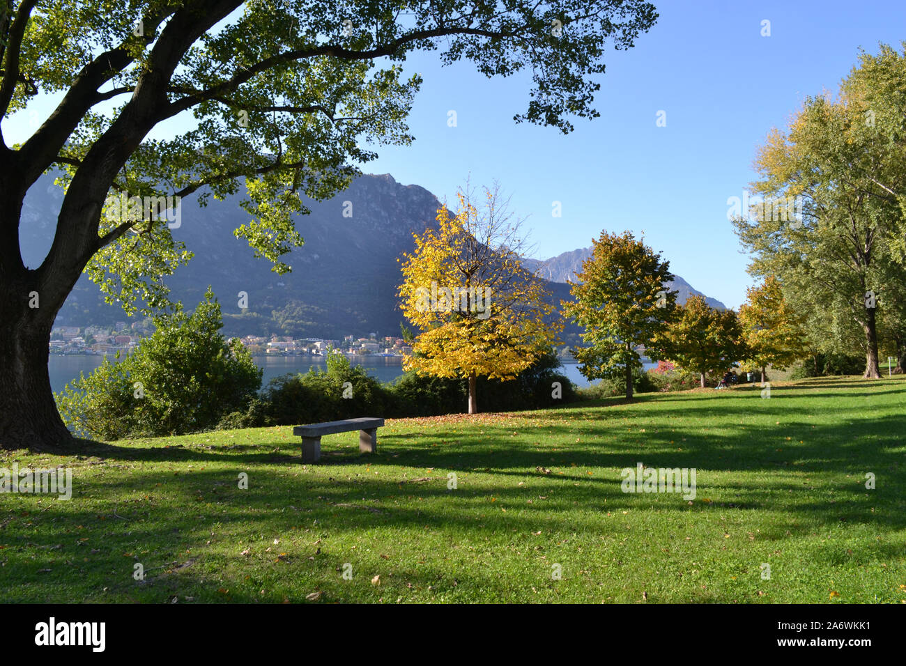 Beautiful panoramic view to Lecco lakefront and lake Garlate in autumnal sunny day. Stock Photo