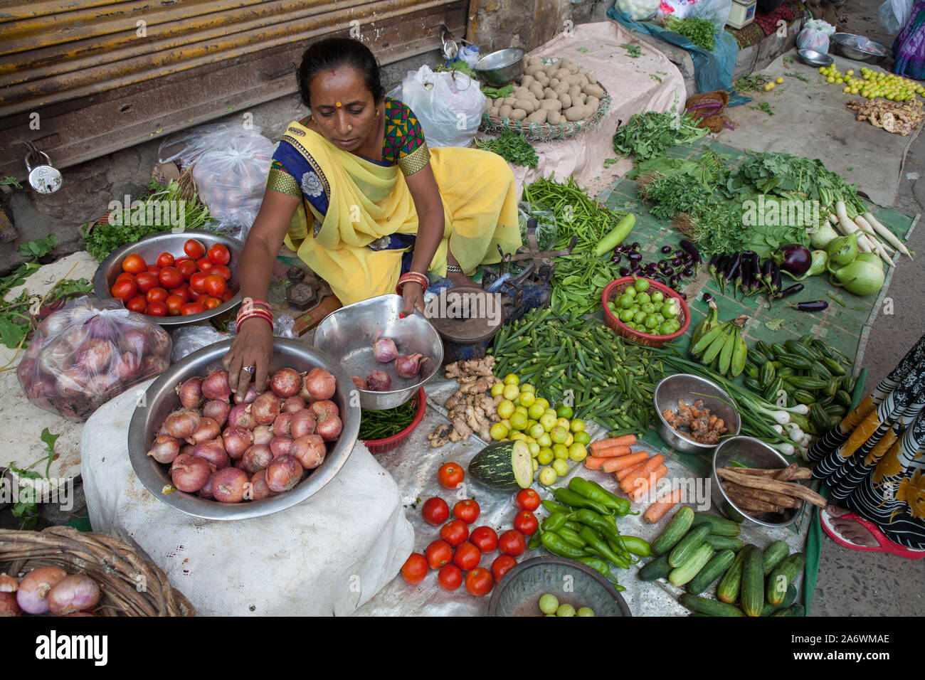 Vendor selling vegetables in the old city of Delhi Stock Photo