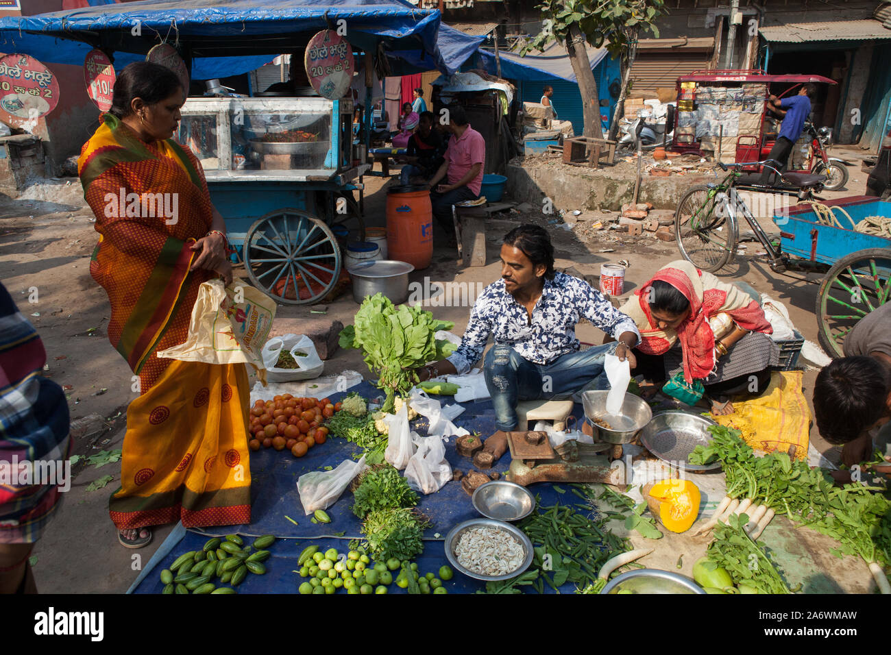 Old man selling vegetables hi-res stock photography and images - Alamy