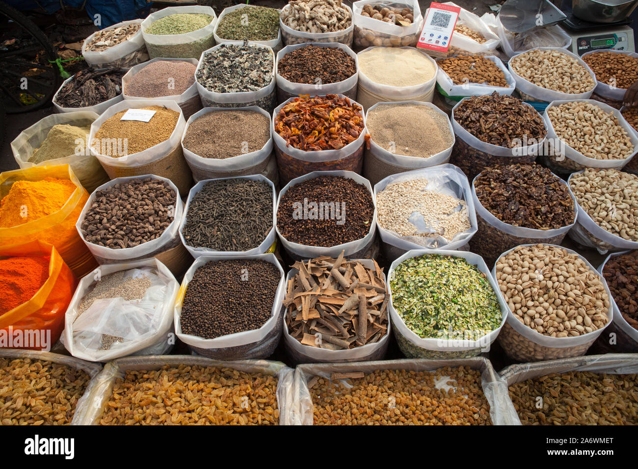 Display of spices in the market of the old city of Delhi Stock Photo