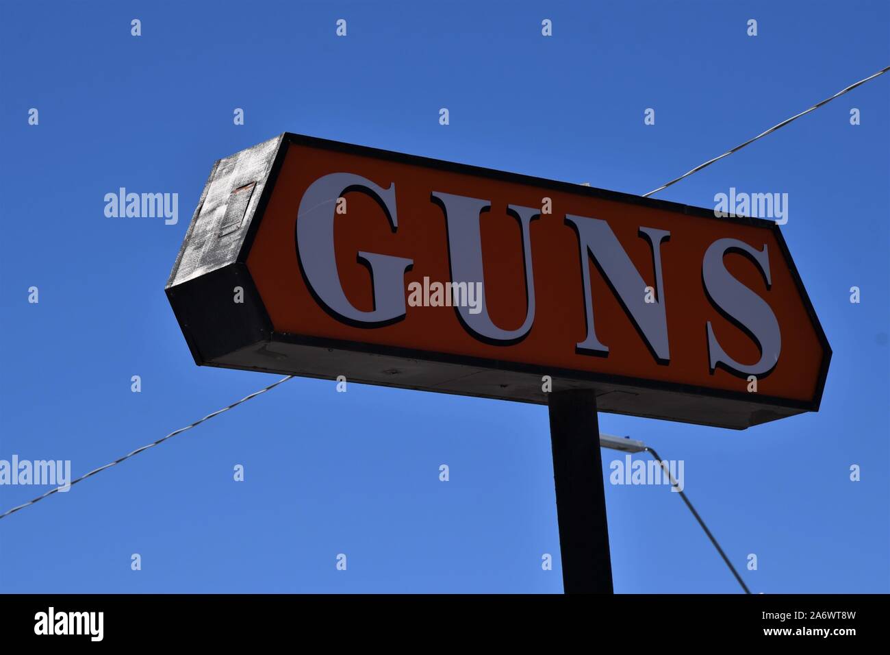 Sign saying guns Stock Photo Alamy