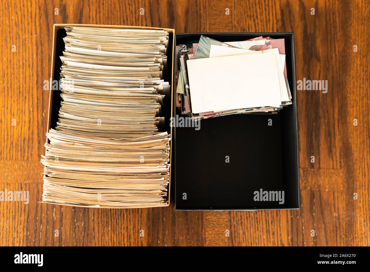 Stack of old photo prints and Memories to be digitized a Stock Photo