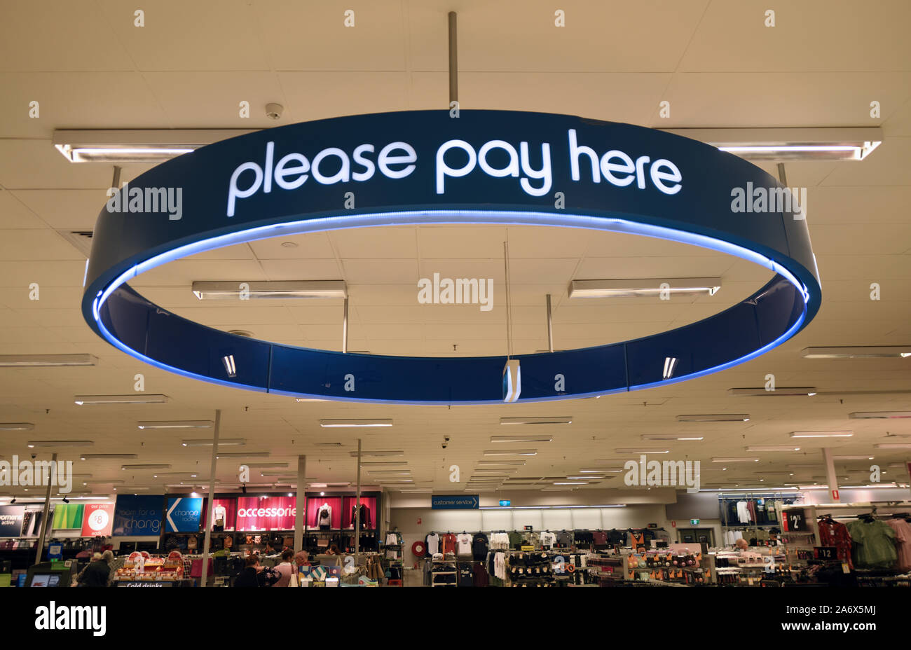TOOWOOMBA, AUSTRALIA, JULY 27, 2019: Signage in a large department store directs customers to the checkout Stock Photo