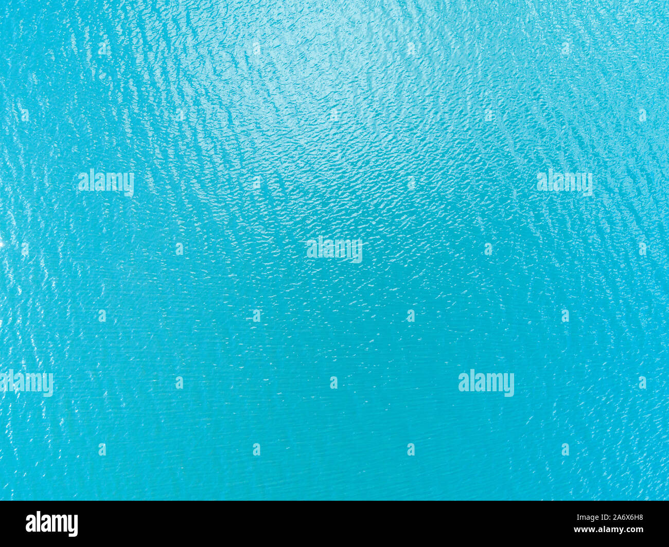 Aerial view of a Crystal clear sea water texture. View from above ...