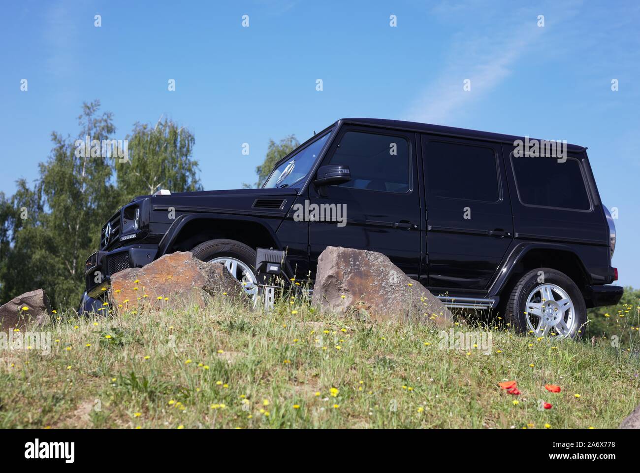 Black Mercedes G-Class on hill, Stock Photo