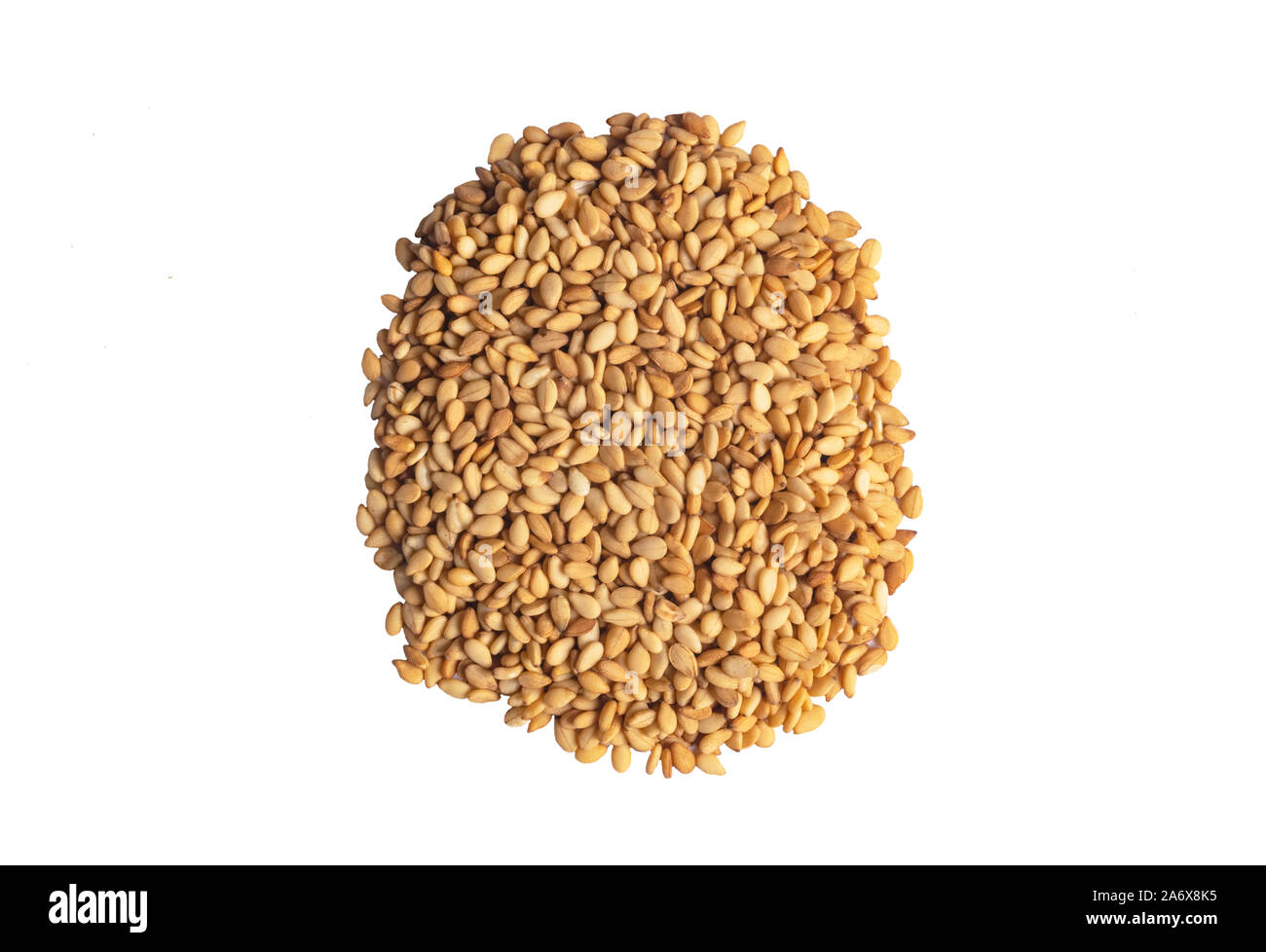Macro shot of a raw white sesame seed isolated on white background. Top view. Food Background. A scattering of sesame seeds. Healthy food. Natural foo Stock Photo