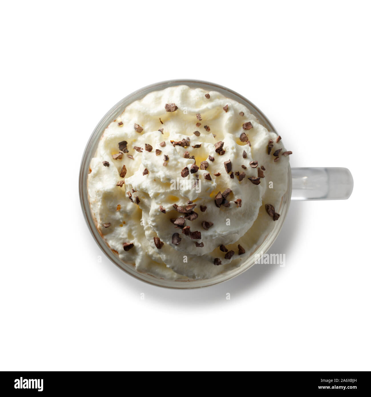 Glass with Espresso con panna sprinkled with chocolate chips. Also known as Vienne, Viennois or Franziskaner. Isolated on white background. Top view. Stock Photo