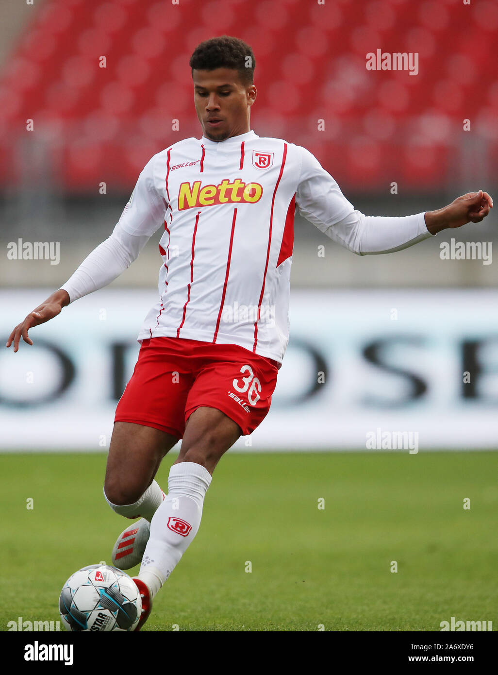 Nuremberg, Germany. 27th Oct, 2019. Soccer: 2nd Bundesliga, 1st FC Nuremberg - Jahn Regensburg, 11th matchday in Max Morlock Stadium. The Regensburg Chima Okoroji plays the ball. Credit: Daniel Karmann/dpa - IMPORTANT NOTE: In accordance with the requirements of the DFL Deutsche Fußball Liga or the DFB Deutscher Fußball-Bund, it is prohibited to use or have used photographs taken in the stadium and/or the match in the form of sequence images and/or video-like photo sequences./dpa/Alamy Live News Stock Photo